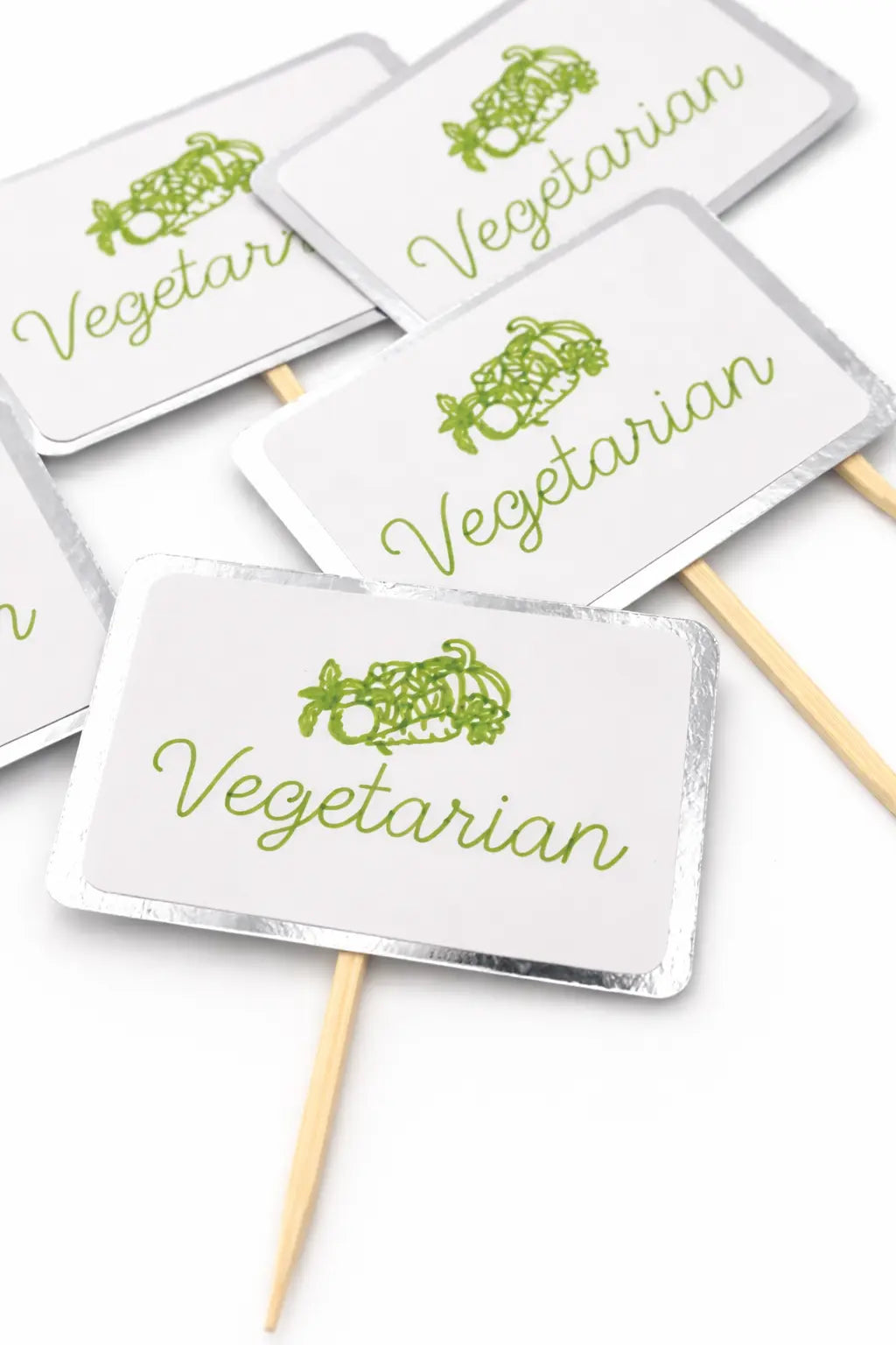 Set of 'Vegetarian' signs with green text and white backgrounds on a white background.